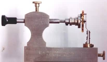 Dorrington tool for polishing pivots of a watch balance wheel