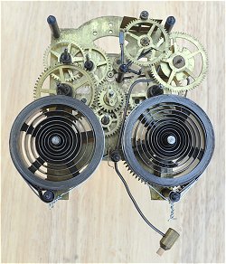 1910 Ansonia porcelain clock mechanism view of gears