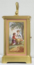 French carriage clock with fine art on the side panel